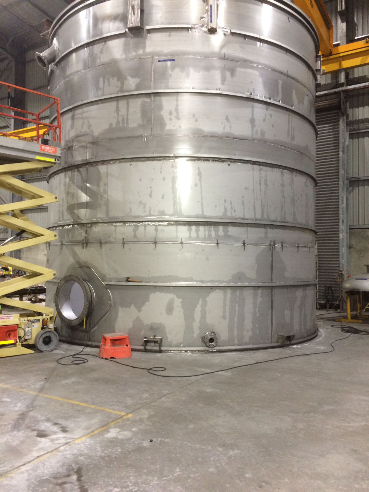 Large stainless steel tank fabricated in the Priority Construction workshop