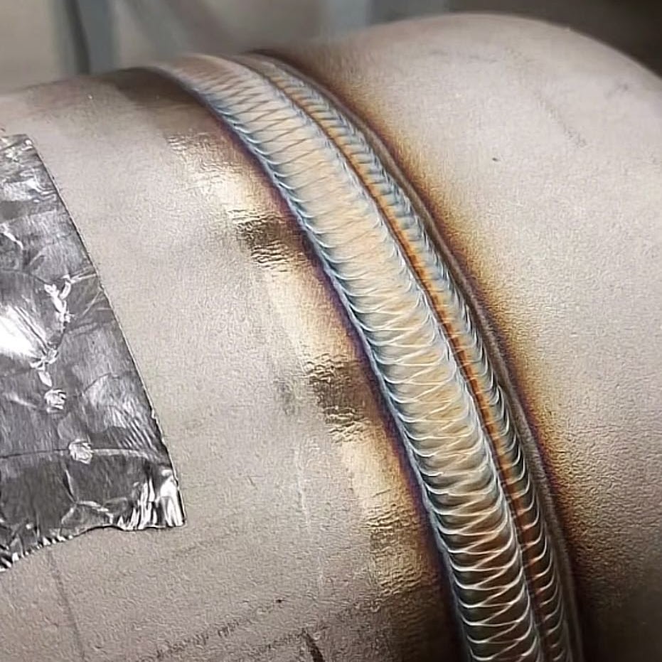 Close-up of precision TIG weld bead